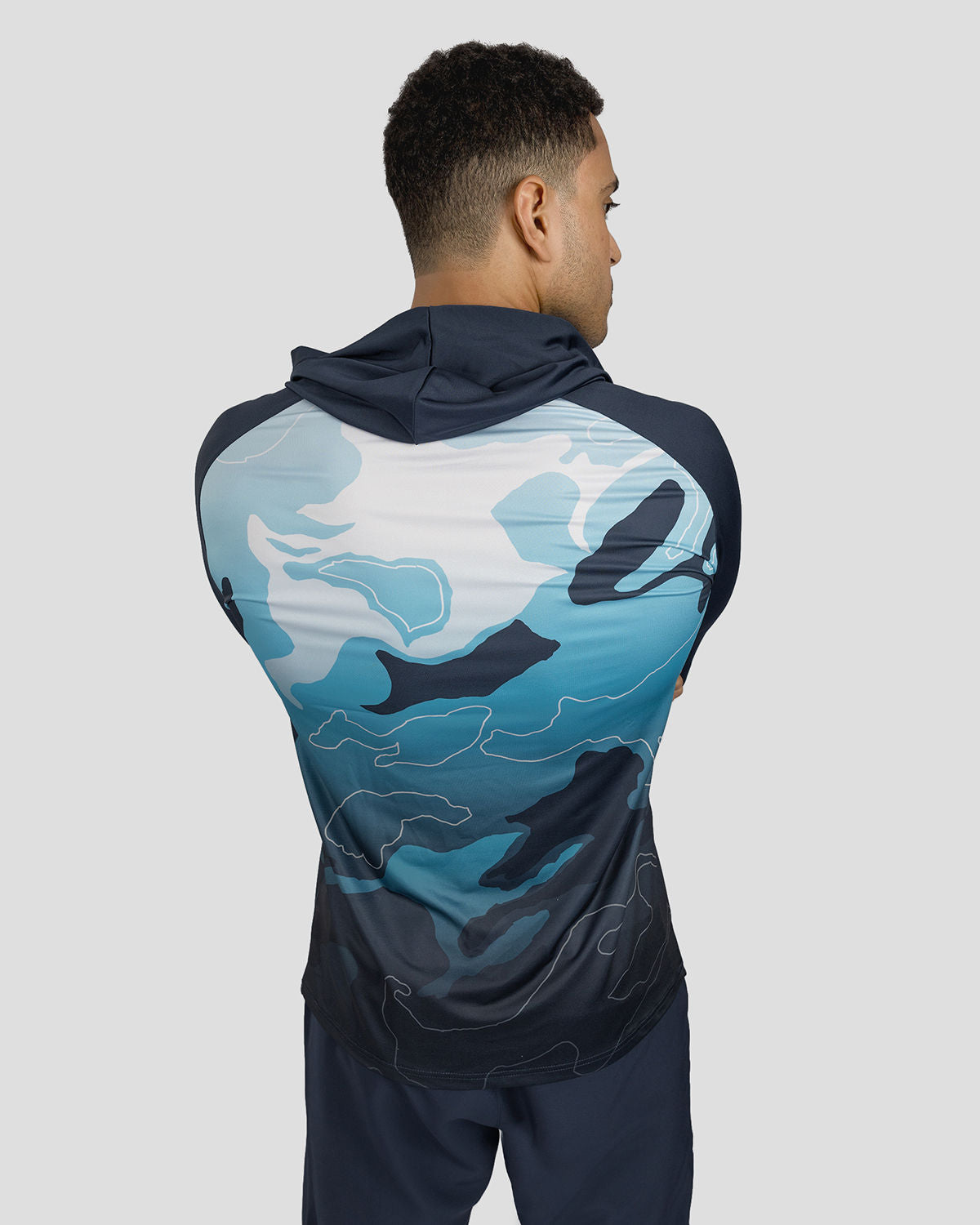 Photo by ð—”ð—§ð—¨ð— SPORTSWEAR ® on December 20, 2022. May be an image of 1 man wear navy training t-shirt.